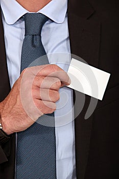 Removing business card from pocket