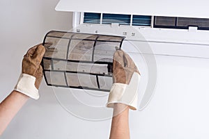 Removing dirty air conditioner filter