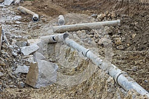 Removing old large pipes excavation