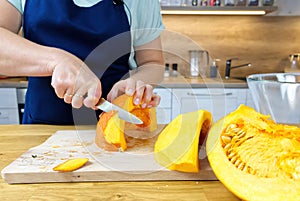 removing the skin from pumpkin with knife