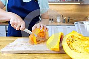 removing the skin from pumpkin with knife