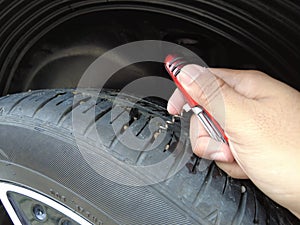 Removing Small Stone From Tires Tread with Tools