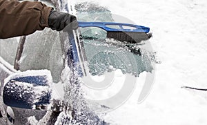 Removing snow from car