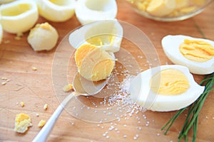 Removing yolks from hard-boiled eggs