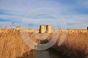 The rempart of Aigues mortes, view of the public parc and the wall of the city of Aigues Mortes, France