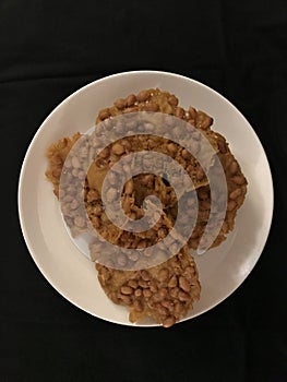 Rempeyek Kacang or Peanuts Crackers photo