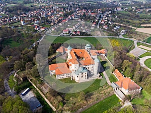 Renaissance Castle on the hill in Nowy WiÅ›nicz, Poland, aerial drone view