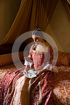Renaissance lady with letter photo