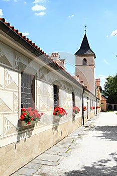 Renaissance outbuildings with Virgin Mary`s Church on palace Kratochvile