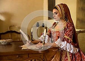 Renaissance woman with French hood with feather quill