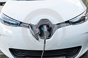 Renault Zoe electric vehicle charging at a public terminal