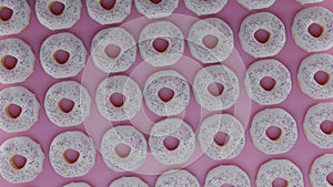 Render of a large number of donuts with white icing