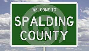 Road sign for Spalding County photo