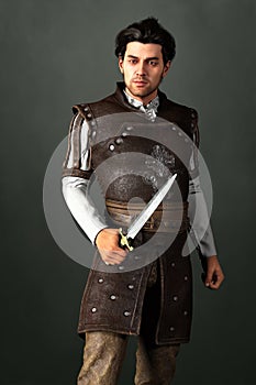 Rendering of a handsome medieval noble man holding a sword