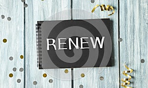 Renew text on black notepad on