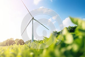 Renewable energy concept with leaves in foreground and wind mill turbine in background