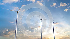 Renewable energy concept with wind mill farm with blue sky 4k footage