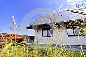 Renewable energy house with photovoltaic roof