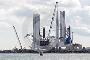 Renewable energy offshore windfarm industry wind turbine construction and distribution