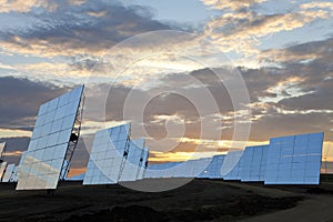 Renewable Energy Solar Mirror Panels at Sunset