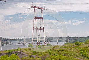 Renewable energy sources and relay masts across the river