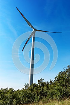 Renewable energy - Wind turbine above the hill