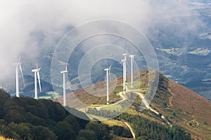 Renewable energy. Wind turbines, eolic park in scenic landscape of basque country, Spain.