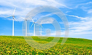 Renewable energy with wind turbines. Wind turbine in green hills.