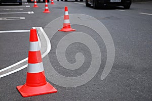 Renewing of parking marking on the road,traffic cones