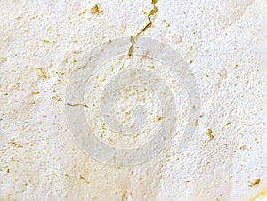 Rennet cheese with holes  texture, background