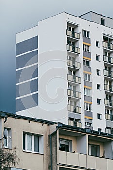 renovated housing tower block and Old communist tower block block