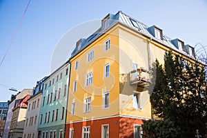 Renovated old building, between new buildings