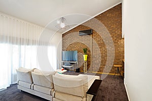 Renovated 70s architectural apartment with angeld roofline photo