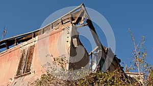 renovating incentive for crumbled buildings with roof gutter house background