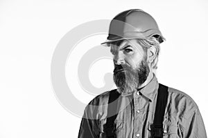 Renovation concept. Mechanic perform technical work. Bearded mature man in uniform. Reputation of excellent worker