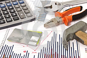 Renovation graphics and hammer and credit card