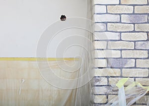 Renovation at home decorate wall clinker brick tile glue photo