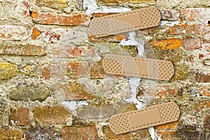 Renovation of an old cracked brick wall - concept image with cop