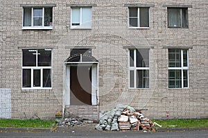 Renovation with replacement of windows with plastic double-glazed windows in a brick building