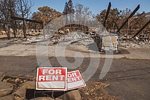 For Rent sign by burned out mobile home park in Oregon