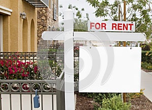 For rent sign with homes in background