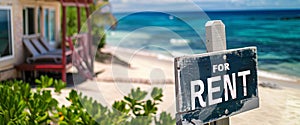 For rent sign with tropical beach in background.