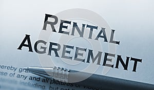 Rental agreement form on desktop in business office showing real estate concept