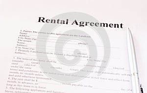 Rental agreement form with pen