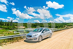 Rental car on dirt road in Uruguay