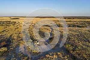 Rental car with rooftop tent -in the Kalahari , Africa