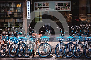 Rental electric bikes parked on the sidewalk, Hangzhou