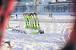 Rental electric scooters are being rendered useless due to heavy  snow and ice, covering roads and the scooter itself. Situation