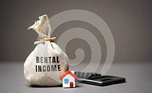 Rental income concept. The concept of profit from the rental of real estate, apartments or houses. Landlord income from housing.