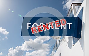 RENTED sign